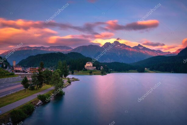 Romantic lakeside hotel terrace at sunset