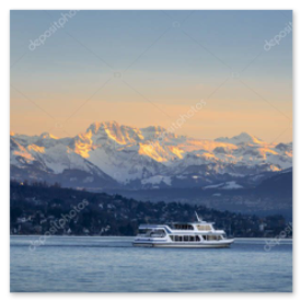 Lake cruise with mountain panorama