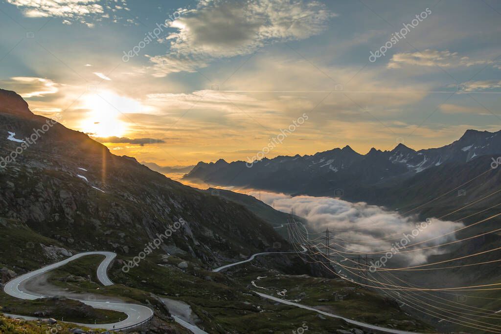 Convertible on panoramic alpine pass